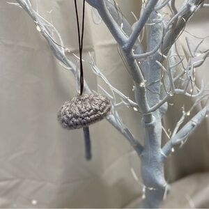Mushroom crocheted Christmas ornament